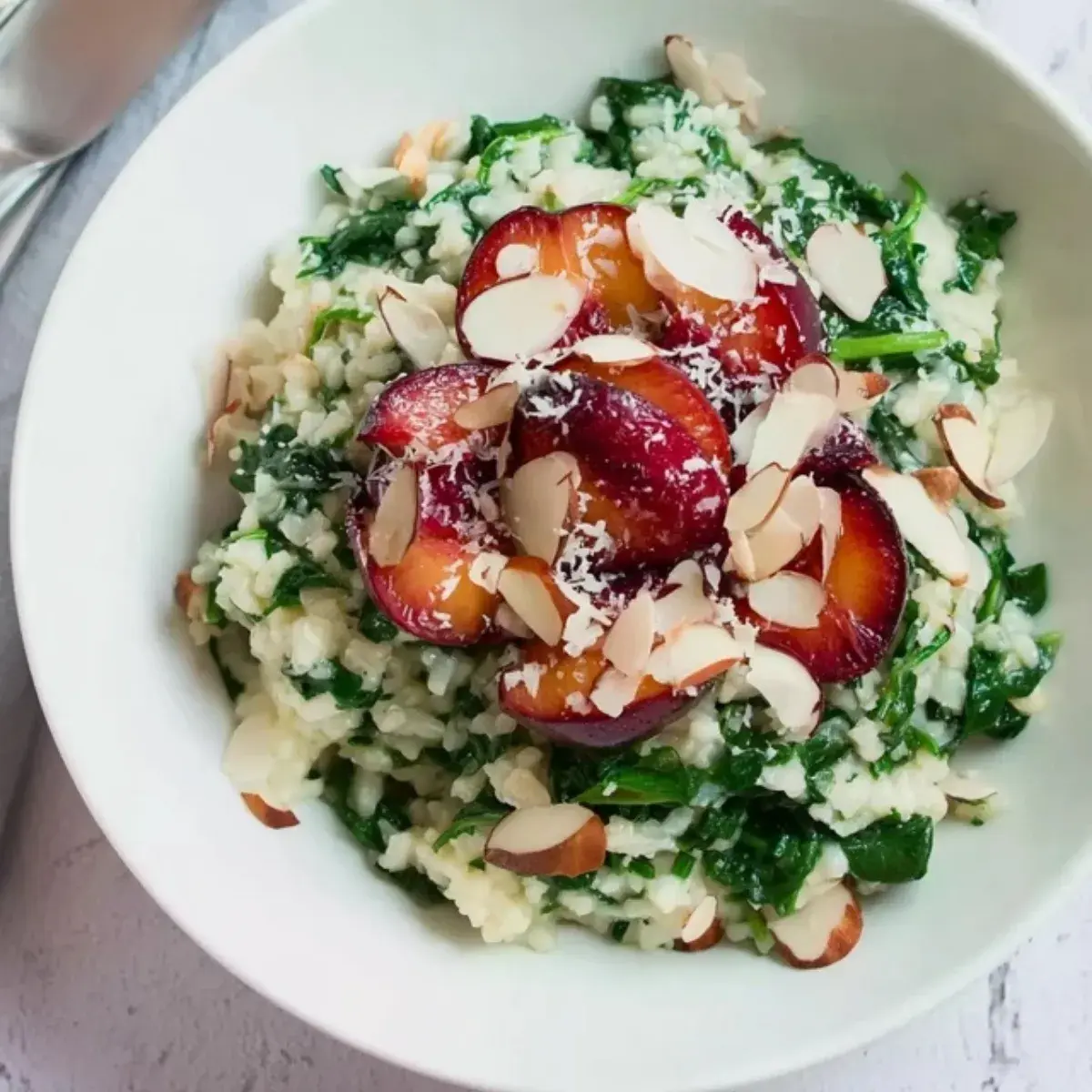 Spinat Gorgonzola Risotto Mandelpflaumen